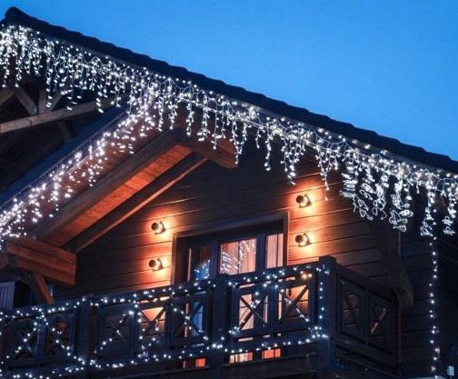 Бахрома на крыше дома